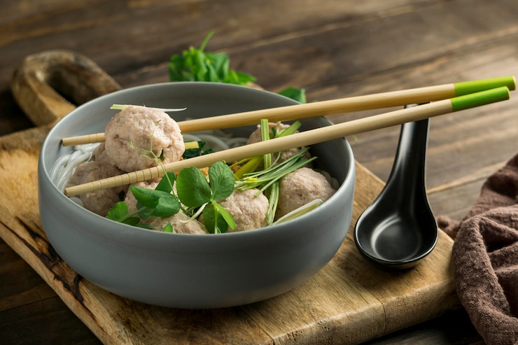 high-angle-delicious-bakso-bowl-composition_23-2148967913